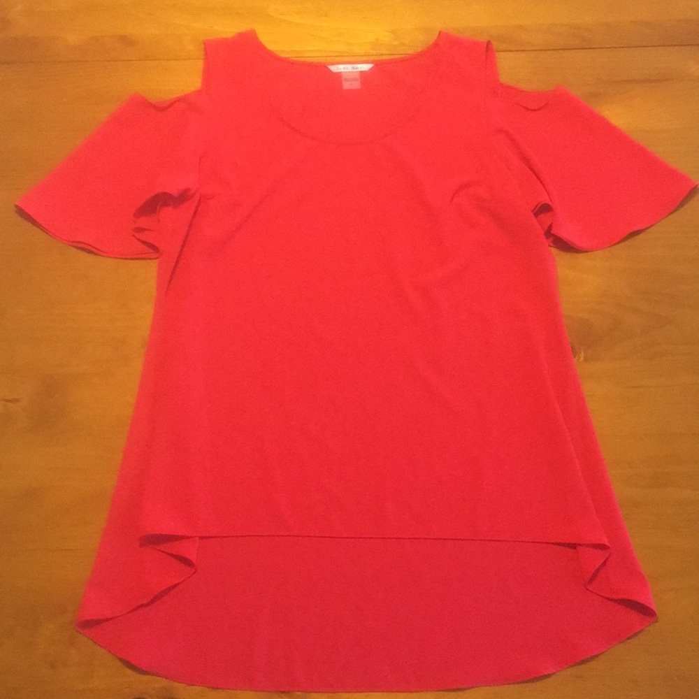 Bright red Nygard hi-low cold shoulder top